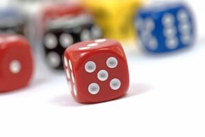 A handful of six-sided dice. Entering the market doesn't have to be a krapshoot with long-term investing approaches.